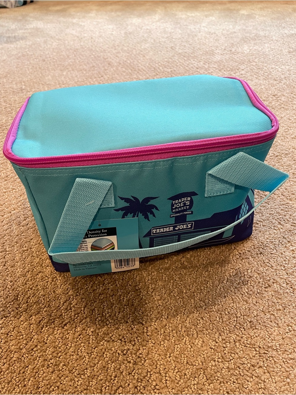Trader Joe's Turquoise, Purple (inside), pink zippers Insulated Lunch Bag